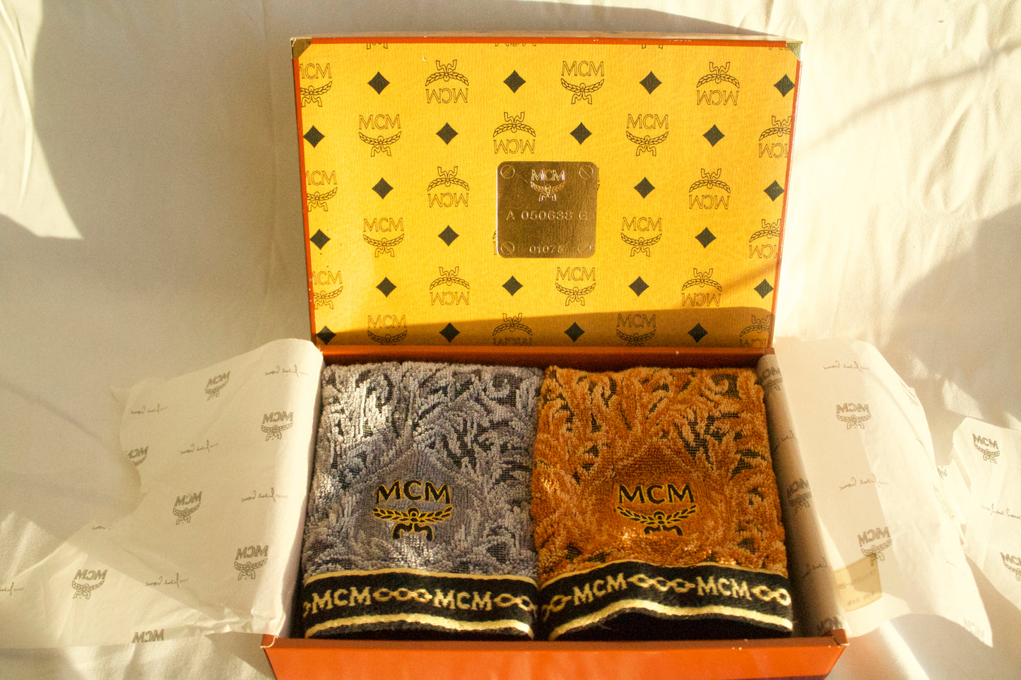 MCM Towels new in box.